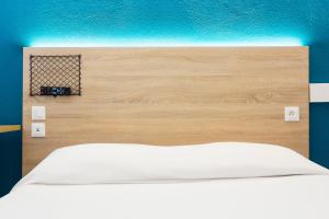 Letto o letti in una camera di Hôtel F1 Reims Tinqueux