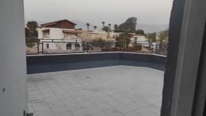 a view of a swimming pool from a house at Villa Vered in Eilat