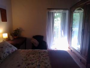 Posteľ alebo postele v izbe v ubytovaní Charming cottage in the heart of the Ribera sacra