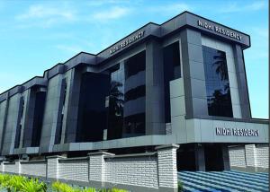 a building with the name of the korean embassy at NIDHI RESIDENCY in Guruvāyūr