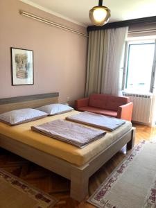 Postel nebo postele na pokoji v ubytování Apartments and rooms by the sea Barbat, Rab - 4973
