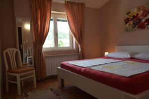 Postel nebo postele na pokoji v ubytování Apartments and rooms by the sea Barbat, Rab - 4973