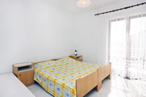 Ένα ή περισσότερα κρεβάτια σε δωμάτιο στο Apartments by the sea Sobra, Mljet - 4908
