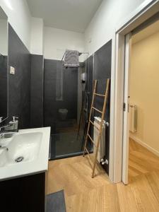 a bathroom with a sink and a toilet in a room at Little House 5 Terre in La Spezia +10 photos