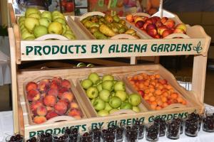 a display of fruits and vegetables in wooden baskets at Flamingo Grand Hotel & Spa in Albena