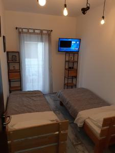 Postel nebo postele na pokoji v ubytování Apartments by the sea Podaca, Makarska - 6677