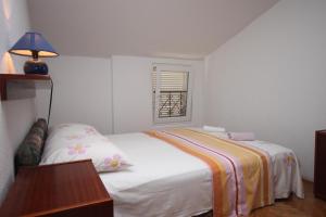 Fotografia z galérie ubytovania Apartments by the sea Podgora, Makarska - 6705 v Podgore