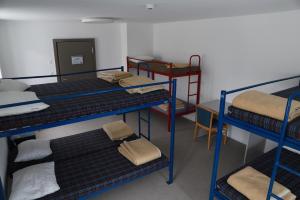 Voodi või voodid majutusasutuse L'auberge de Noiraigue toas