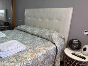 Postel nebo postele na pokoji v ubytování Gijón Playa by FlowHome