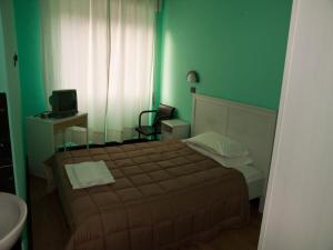 Postel nebo postele na pokoji v ubytování Le Stanze di Boccadasse