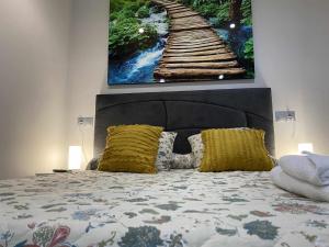 Postel nebo postele na pokoji v ubytování Urquijo Playa by FlowHome