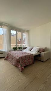 En eller flere senge i et værelse på ApartmentInCopenhagen Apartment 1506