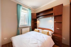 Posteľ alebo postele v izbe v ubytovaní Metro Wilanowska Homely Apartment