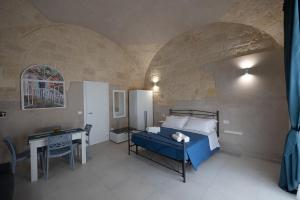 Postel nebo postele na pokoji v ubytování B&B Talino