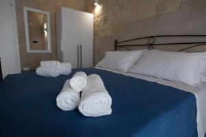 Postel nebo postele na pokoji v ubytování B&B Talino