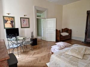 Posteľ alebo postele v izbe v ubytovaní Chateau de Viviez