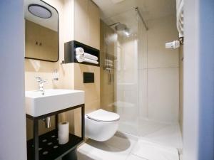 Kúpeľňa v ubytovaní MK Apartamenty Złocisty