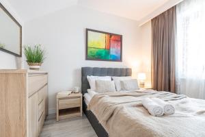 Posteľ alebo postele v izbe v ubytovaní Apartament Droga na Bystre 5b/8