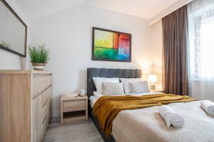 Posteľ alebo postele v izbe v ubytovaní Apartament Droga na Bystre 5b/8