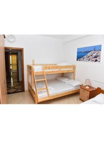 a room with two bunk beds in it at Sangiovanni in Shëngjin