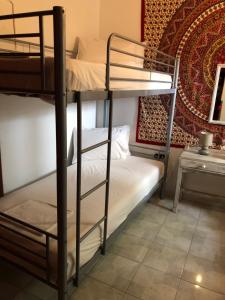 Posteľ alebo postele v izbe v ubytovaní Rhodes Backpackers Boutique Hostel and Apartments