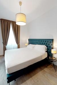 Postel nebo postele na pokoji v ubytování Boutique Hotel Palazzo Donna Iulia