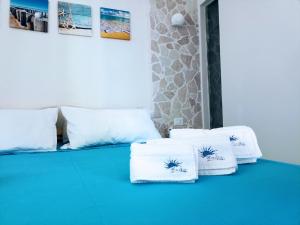 Кровать или кровати в номере BlueSun Apartments