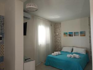 Кровать или кровати в номере BlueSun Apartments