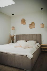 Tempat tidur dalam kamar di Nadolnik apartment