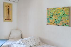 Posteľ alebo postele v izbe v ubytovaní La Ponderosa 5