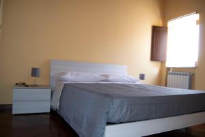 Postel nebo postele na pokoji v ubytování Malies B&B