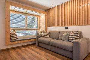 A seating area at Apartement Franzl
