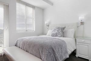 Ένα ή περισσότερα κρεβάτια σε δωμάτιο στο Horizon Bay 1106 Beachfront Self-catering APT by HMH +16 φωτογραφίες