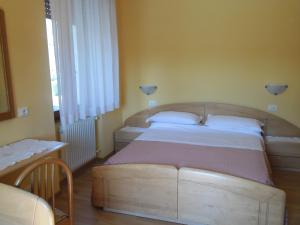 Posteľ alebo postele v izbe v ubytovaní Hotel Cantaleone