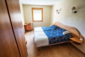 Posteľ alebo postele v izbe v ubytovaní Gîte des Courtans de Jeanne