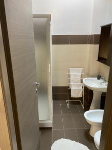 a bathroom with a toilet and a sink at Il Miglio in Più in Castel di Tusa +37 photos