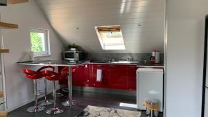 Kuchyňa alebo kuchynka v ubytovaní Chalet l Écrin Vert