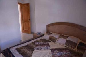 Postel nebo postele na pokoji v ubytování Hotel St Jean
