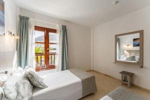 Кровать или кровати в номере Klayman Olivina Aparthotel