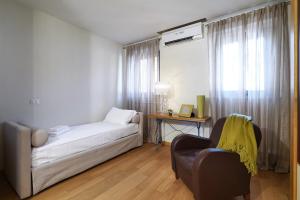 Voodi või voodid majutusasutuse Contempora Apartments - Fiori Chiari 26 toas