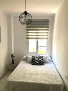 Posteľ alebo postele v izbe v ubytovaní Apartamento en el Centro de Málaga