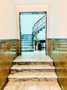 a staircase in a building with a stair case at Senhor Gigi in Faro