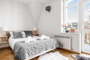 Posteľ alebo postele v izbe v ubytovaní House'27