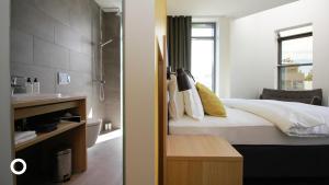 Cama ou camas em um quarto em Center Hotels Laugavegur