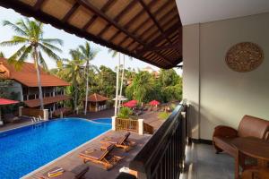 a view from the balcony of a resort with a swimming pool at Best Western Premier Agung Resort Ubud in Ubud