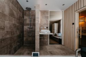 Een badkamer bij Villa Westerduin