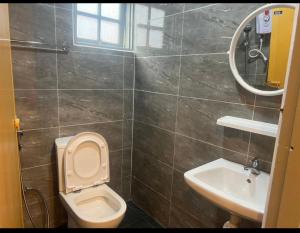 A bathroom at ESM Hotel