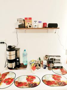 a kitchen counter with three bowls of food on it at Casa Borcean 2 in Sasca Montană