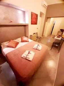 Postelja oz. postelje v sobi nastanitve Il Sogno Torino Guesthouse