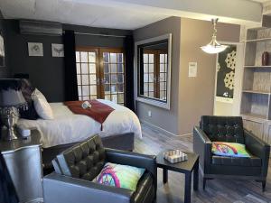 A bed or beds in a room at @Grace Guesthouse